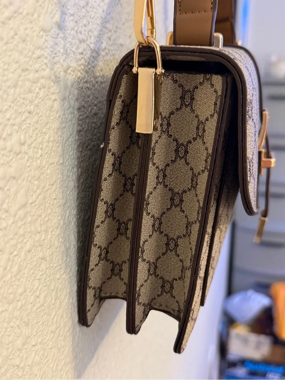 Beige Brown Monogram Shoulder Bag with Gold Buckle with a matching wallet.